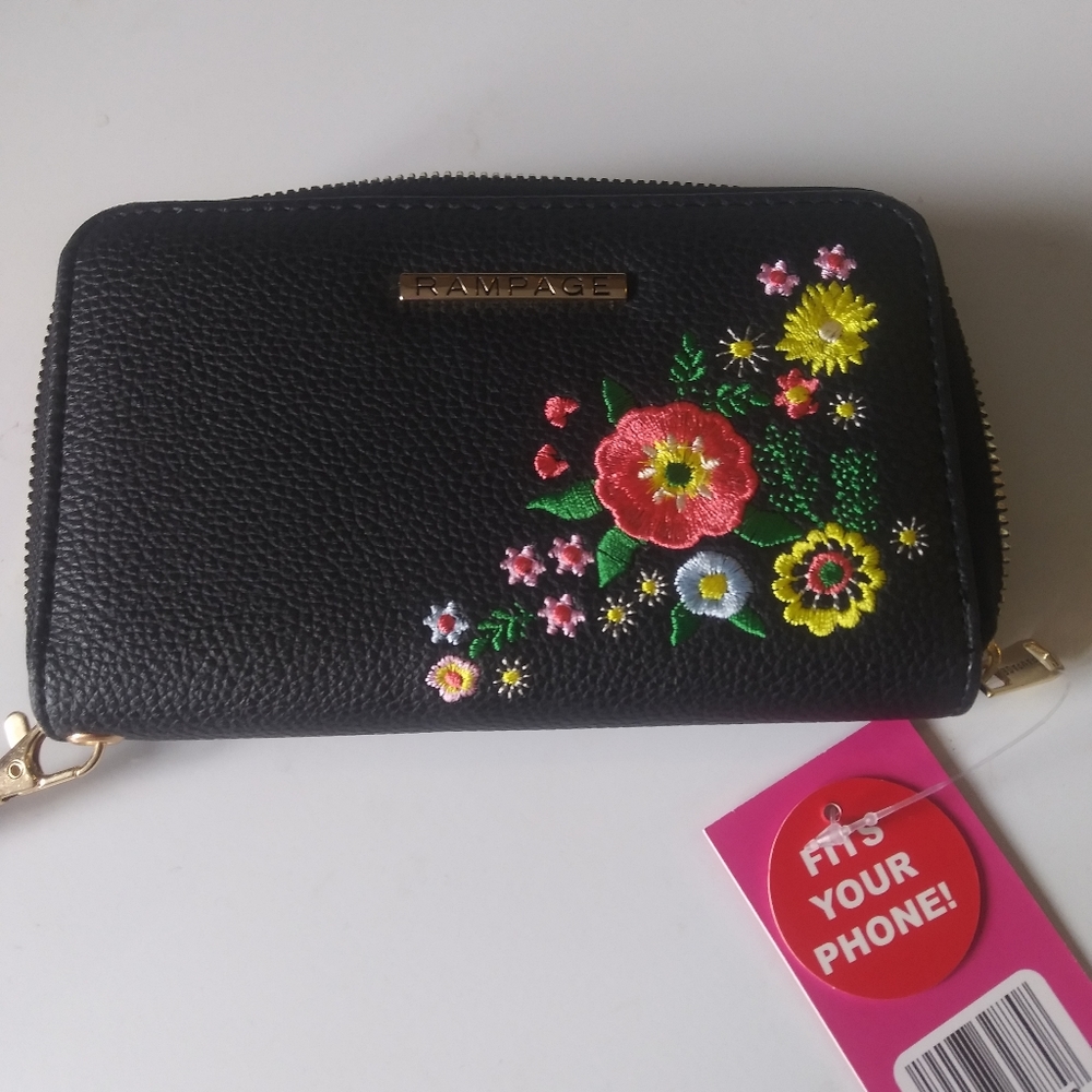 Brand new wallet that you can put your phone in...never used